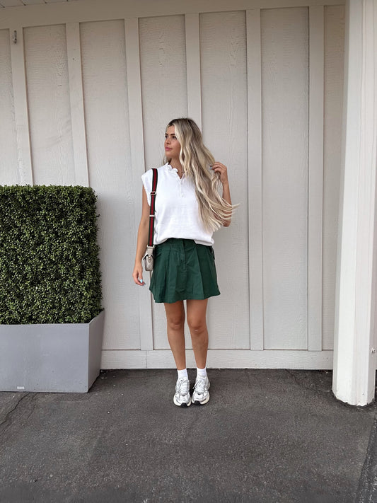 Pleats to meet you mini skirt